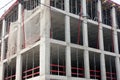 Corner of concrete building under construction with monolithic reinforced concrete frame in Moscow, Russia Royalty Free Stock Photo