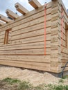 Corner connection of wooden log house. Timber house wall