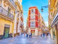 The corner facade of edifice in Calle Ancha, Cadiz, Spain