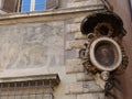 Corner with frescoes and painting of the Virgin of the prayer of the Ricci palace to Rome in Italy.