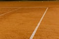 Corner of the ground tennis court with white lines Royalty Free Stock Photo