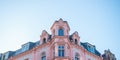 Corner of historical tenement, build by the end of XIX century in eclectic style. Example of great renovation of old building. Royalty Free Stock Photo