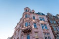 Corner of historical tenement, build by the end of XIX century in eclectic style. Example of great renovation of old building. Royalty Free Stock Photo