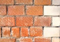 The corner of the house is made of bricks with a decorative corner element Royalty Free Stock Photo