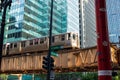 Corner of Lake & LaSalle Streets in Chicago Loop as `el` train crosses on elevated track