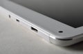 Corner with mini usb of pad tablet. Royalty Free Stock Photo