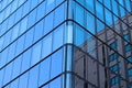 The corner of a modern glass building in Sydney central business district. Royalty Free Stock Photo