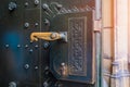 Corner of an open metal street door. Background or backdrop. Detail or element of classic retro vintage exterior