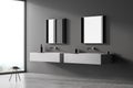 Corner of panoramic grey bathroom with square mirrors