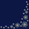 Corner pattern made of handmade paper snowflakes in quilling technique on dark blue background.