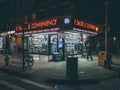 Corner smoke shop at night, in the East Village, Manhattan, New York City