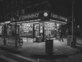 Corner smoke shop at night, in the East Village, Manhattan, New York City