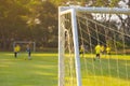 Corner of a soccer or football goal post with warm morning light