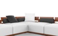 Corner sofa with wooden headrests, white seats and black pillows Royalty Free Stock Photo