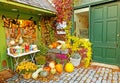 corner store front decorated for Autumn with gourds and pumpkins in Fall Royalty Free Stock Photo