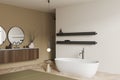 Corner view on bright bathroom interior with bathtub, shower Royalty Free Stock Photo