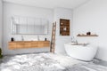 Corner view on bright bathroom interior with bathtub, white walls Royalty Free Stock Photo