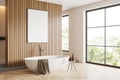 Corner view on bright bathroom interior with empty white poster Royalty Free Stock Photo