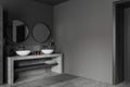 Corner view on dark bathroom interior with double sink Royalty Free Stock Photo