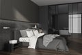 Corner view on dark bedroom and bathroom interior with bed Royalty Free Stock Photo