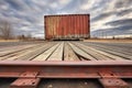 corner view of wooden shipping crate on flatbed railcar Royalty Free Stock Photo