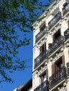 Corner of vintage house in downtown district of Madrid, Spain. Authentic Spanish architecture. Vertical photo Royalty Free Stock Photo