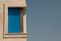 A window with blue shutter Royalty Free Stock Photo