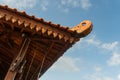 The corner of a wooden joglo house is visible from below. Royalty Free Stock Photo