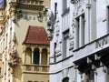 Corners of two different style buildings to Prague in Czech Republic.