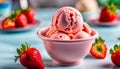 Cornet ice cream with a strawberry scoop on a colorful surface