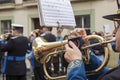 Cornet musician playing at procession