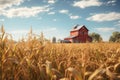 Cornfield with a vintage red barn in the Royalty Free Stock Photo