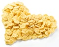 Cornflakes arranged in the shape of heart. Royalty Free Stock Photo
