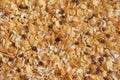 Cornflakes background with almond and raisin.