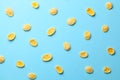 Cornflakes dry breakfast. Yellow flakes pattern on blue background.