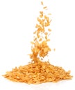 Cornflakes falling into a pile, Royalty Free Stock Photo