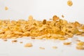 Cornflakes falling into a pile