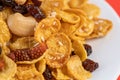 Cornflakes honey caramel homemade with grains, currant, cashew nut, dried strawberries and white sesame healthy food snack on a