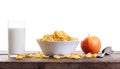 Cornflakes with milk and apple on wooden table Royalty Free Stock Photo