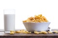 Cornflakes with milk on wooden table Royalty Free Stock Photo