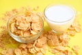 Cornflakes with milk on yellow background, cornflakes bowl breakfast food and snack for healthy food concept, morning breakfast Royalty Free Stock Photo