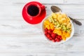 Cornflakes and Rainbow fruit salad , strawberry , coffee for b Royalty Free Stock Photo