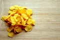 Cornflakes on wood cutboard Royalty Free Stock Photo
