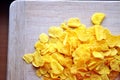 Cornflakes on wood cutboard Royalty Free Stock Photo