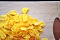 Cornflakes on wood cutboard Royalty Free Stock Photo