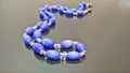 Cornflower beads purple lying