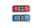 Cornflower blue and cherry red vintage cars with white wall tires - top view Royalty Free Stock Photo