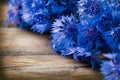 Cornflowers over wood Royalty Free Stock Photo