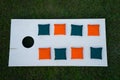 Cornhole Board Flat Lay with beanbags on grass Royalty Free Stock Photo