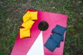 Cornhole Game Board with Stacked Bean Bags